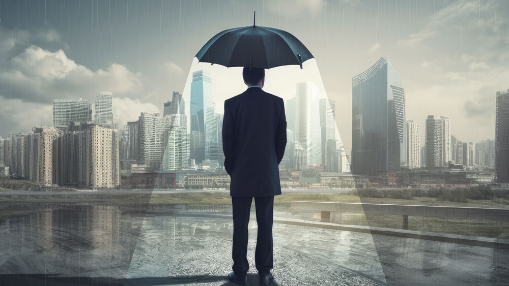 man standing under an umbrella